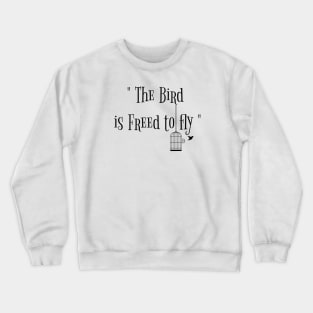 the bird is freed to fly Crewneck Sweatshirt